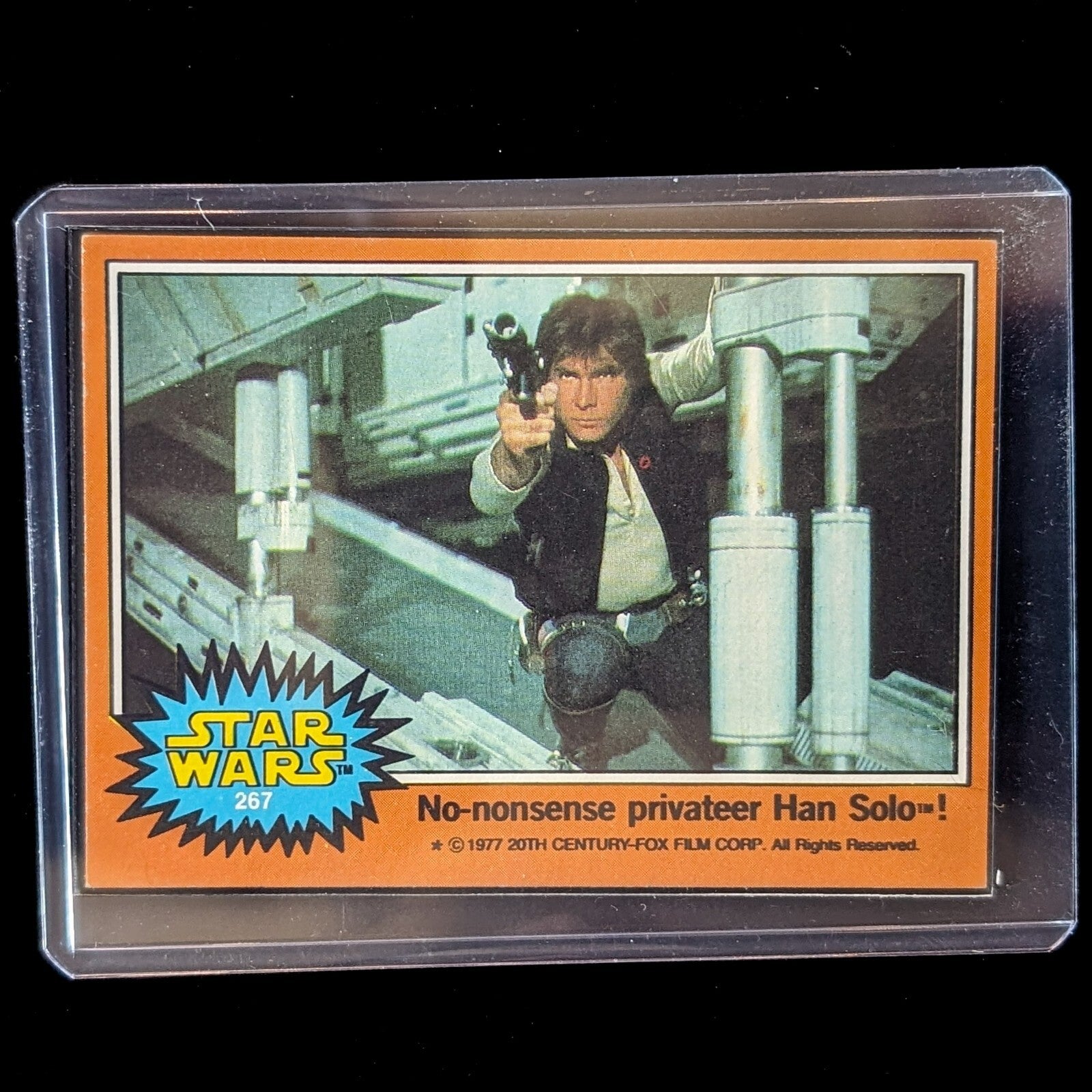 1977 Go Figment vintage Topps Star Wars card featuring Han Solo with a blaster in orange Series 4 border