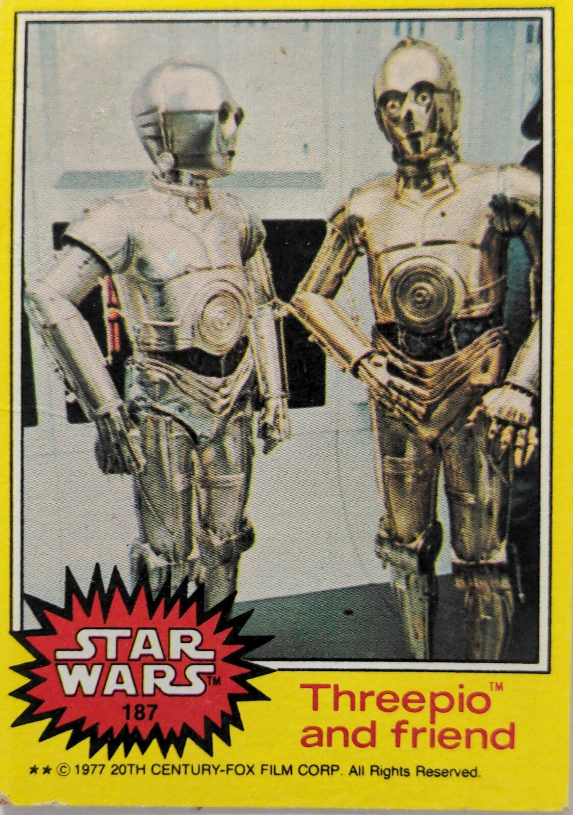 Vintage Star Wars collectible card featuring Threepio and robot companion with yellow border and logo detail