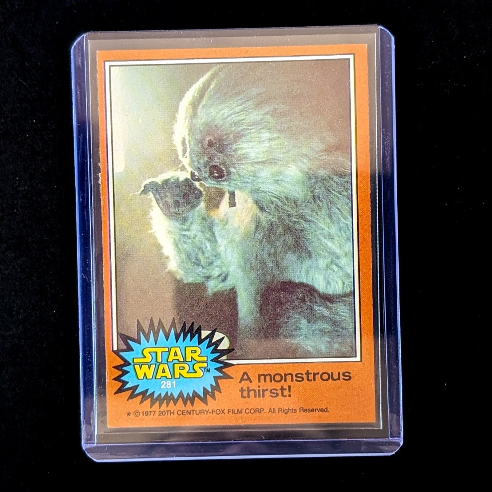 1977 TOPPS Star Wars Orange Series 4 card featuring a Wampa creature, vintage collectible by Go Figment