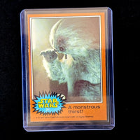 1977 TOPPS Star Wars Orange Series 4 card featuring a Wampa creature, vintage collectible by Go Figment