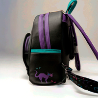 Side profile of Loungefly mini backpack with purple and teal accents featuring a spooky cat design on black faux leather