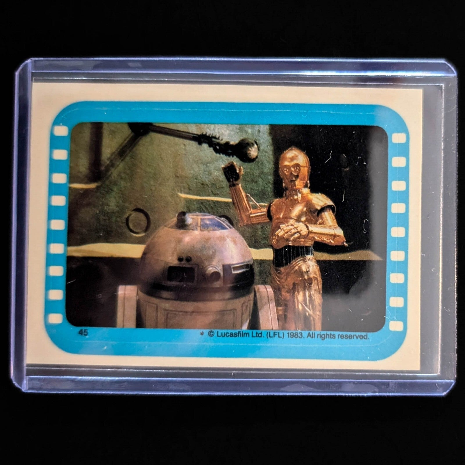 1983 Topps Return of the Jedi sticker featuring C-3PO and R2-D2, vintage collectible from Go Figment