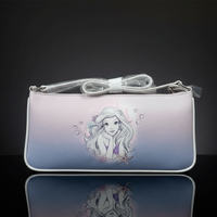 Danielle Nicole baguette bag featuring pastel Ombre background with Ariel illustration and starfish detail on front