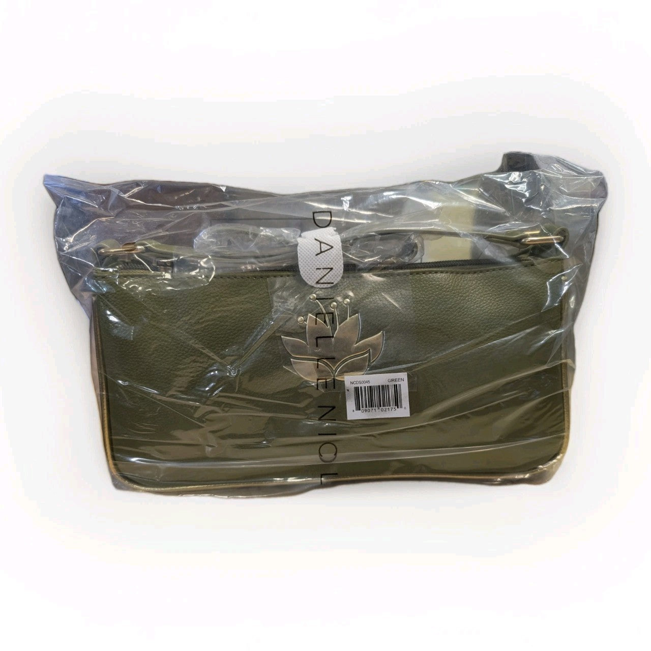 DANIELLE NICOLE green shoulder bag with floral cutout detail and packaged in clear protective plastic wrap