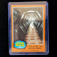 1977 Go Figment Topps Star Wars trading card from Orange Series 4 featuring Luke Skywalker in the Death Star corridor