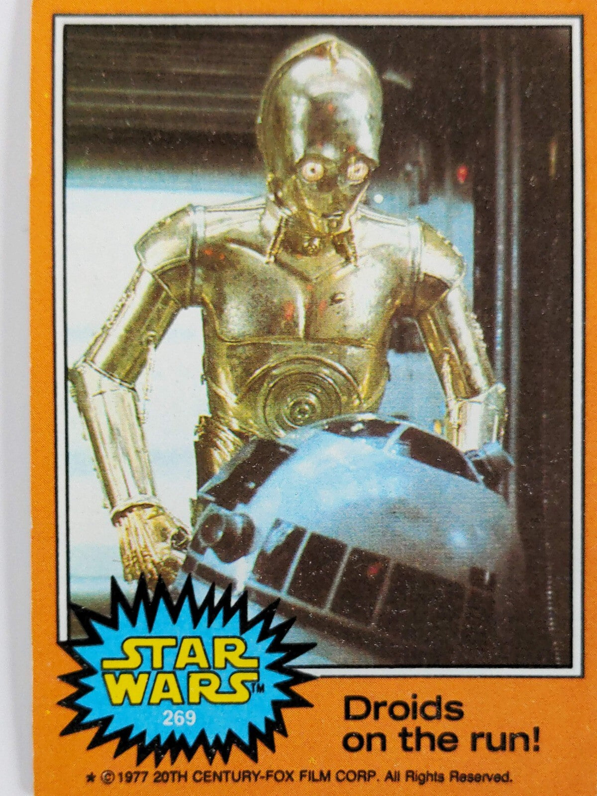 1977 Go Figment Star Wars trading card featuring C-3PO and R2-D2 from Orange Series 4 vintage set