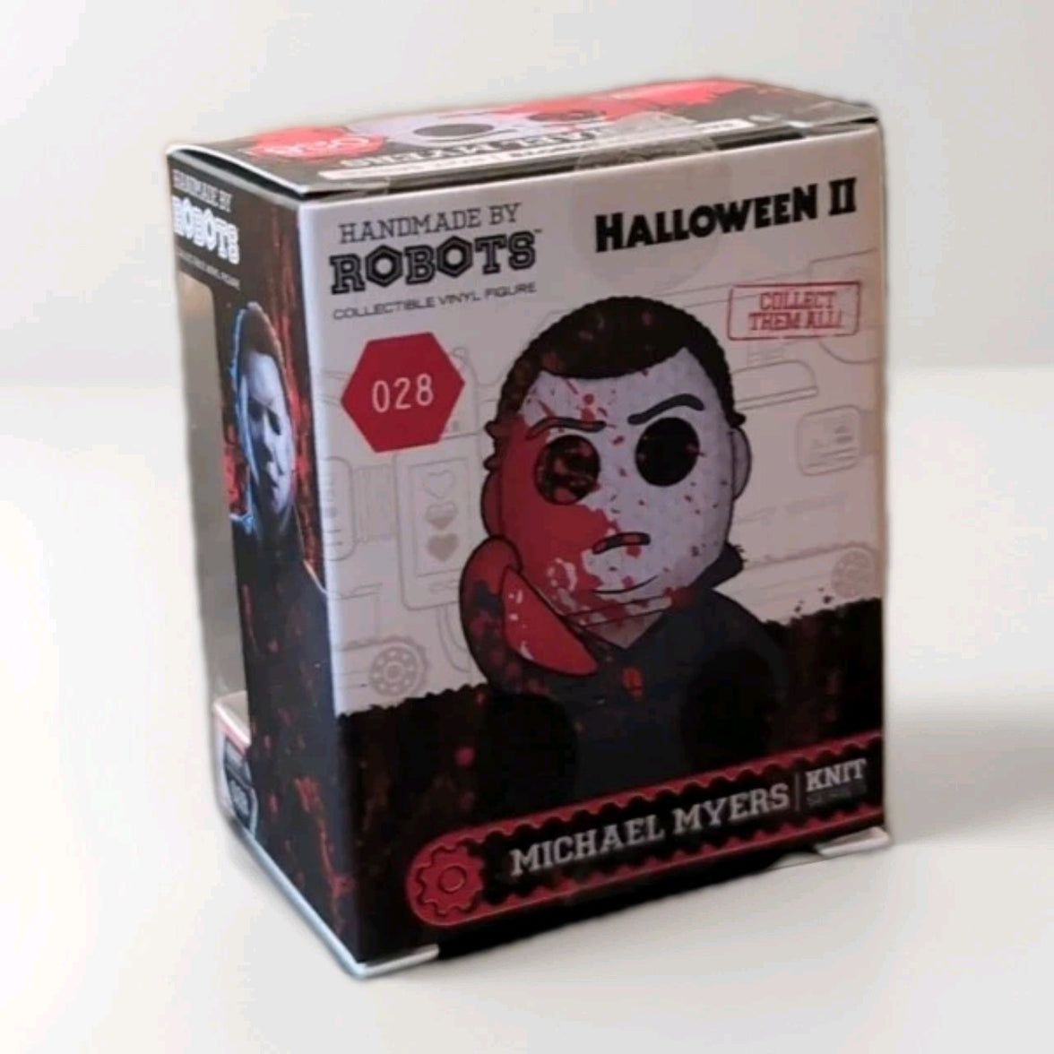 Handmade By Robots collectible micro vinyl figure of Michael Myers from Halloween II in packaging box numbered 028