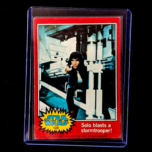 1977 Topps Star Wars trading card featuring Han Solo with blaster aimed at stormtrooper sold by Go Figment