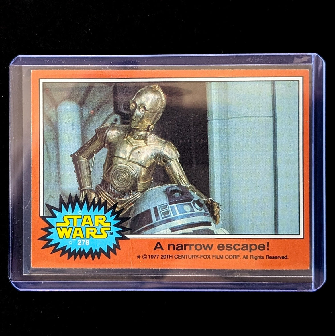 1977 Go Figment TOPPS Star Wars trading card featuring C-3PO and R2-D2 titled A narrow escape
