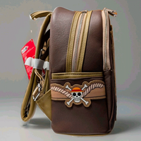Loungefly mini backpack side view with Monkey D. Luffy Jolly Roger emblem on brown faux leather