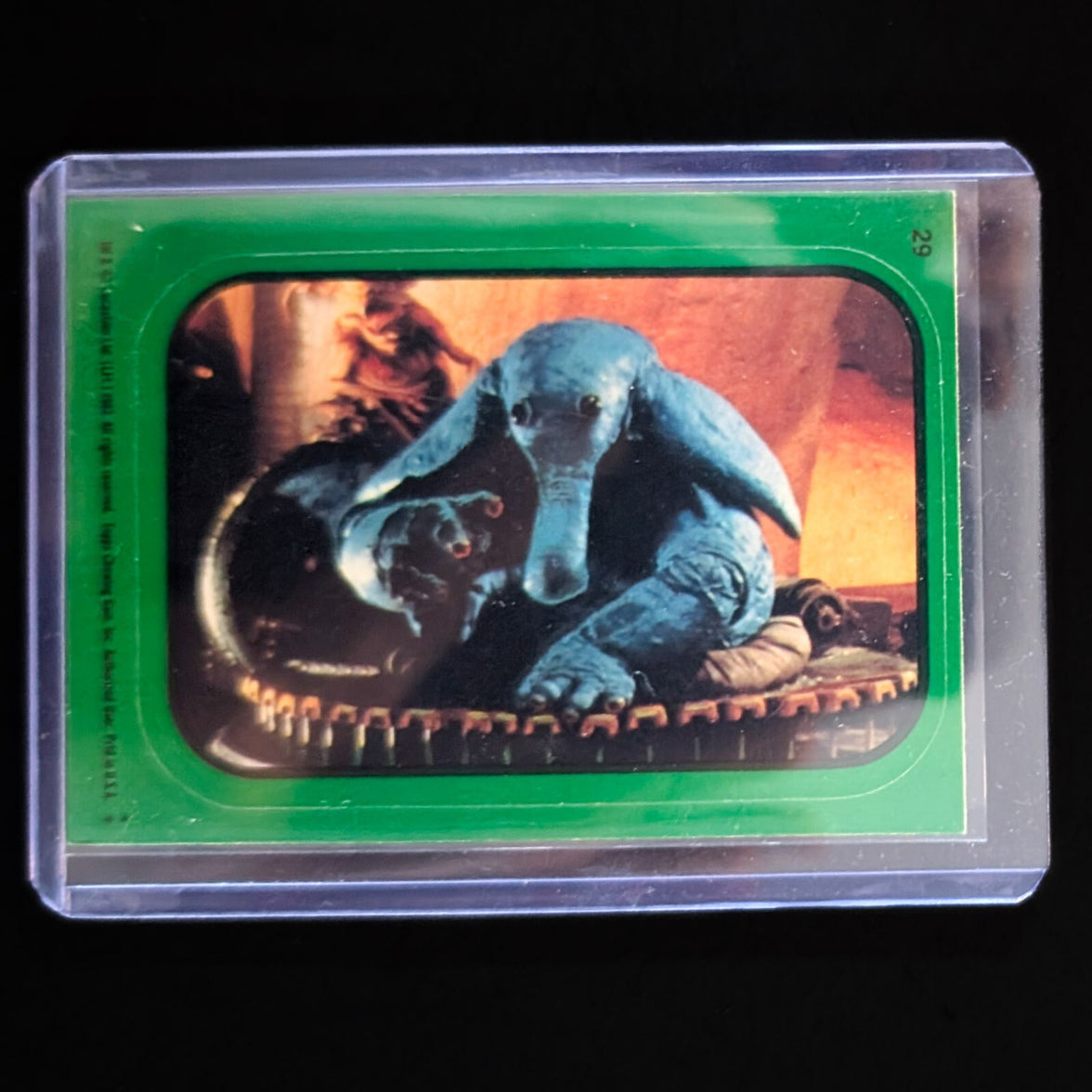 1983 Topps Return of the Jedi vintage sticker card featuring Star Wars character, protected by Go Figment packaging.