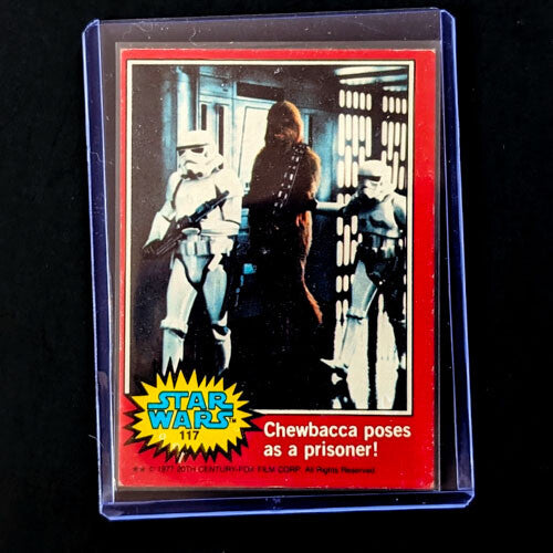 1977 Go Figment Star Wars trading card featuring Chewbacca captured by stormtroopers in red border design