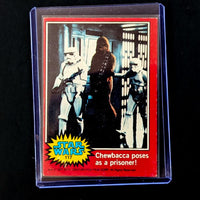 1977 Go Figment Star Wars trading card featuring Chewbacca captured by stormtroopers in red border design