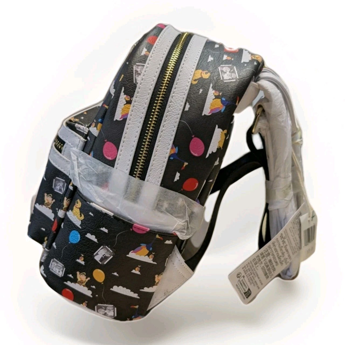 Loungefly black faux leather mini backpack with Pixar Up character and colorful balloon print in new condition