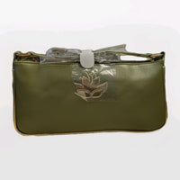 DANIELLE NICOLE olive green shoulder bag with lotus flower metal emblem and wrapped strap in protective packaging