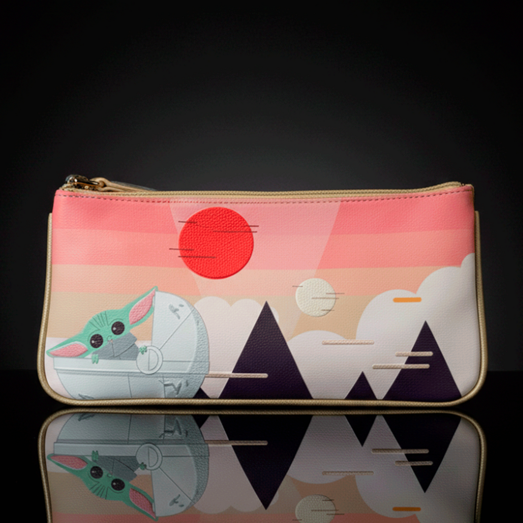 Danielle Nicole crossbody bag featuring Baby Yoda design with stylized mountains and sunset background