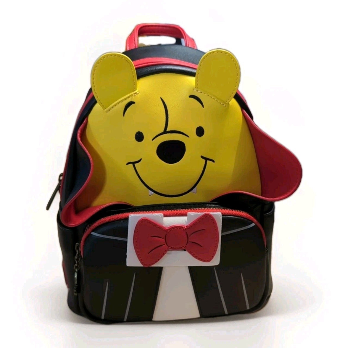 Loungefly mini backpack featuring Winnie the Pooh in vampire cosplay with red bow tie and cape details