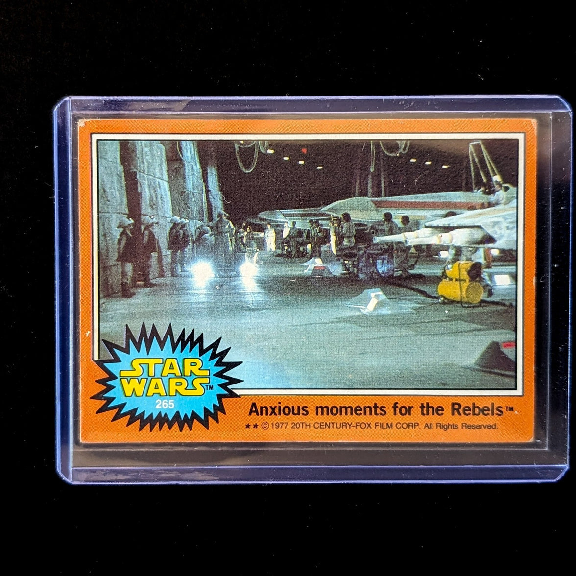 1977 Go Figment TOPPS Star Wars Orange Series 4 trading card featuring Rebel base scene in protective case
