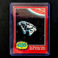 1977 Go Figment Star Wars trading card featuring the Millennium Falcon speeding through space red series two