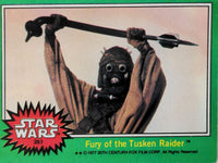 1977 Go Figment Star Wars card featuring Tusken Raider with raised weapon from Topps Green Series 4 collection