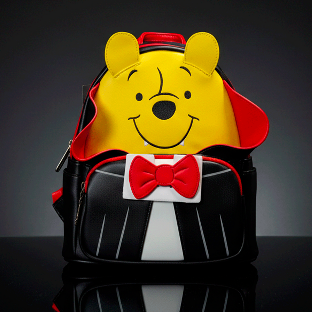 Loungefly mini backpack featuring Winnie the Pooh in a vampire costume with red bow tie and black suit detail