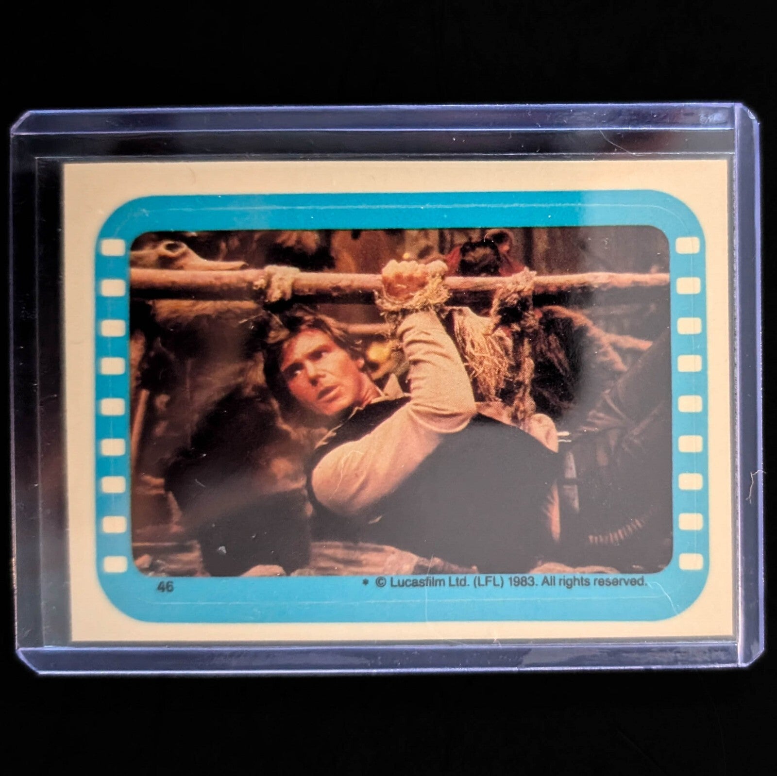 1983 Topps Return of the Jedi blue border sticker featuring Han Solo trapped, vintage collectible from Go Figment