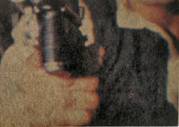 Close-up of a vintage 1977 Topps Star Wars trading card featuring a character holding a blaster, from Go Figment collection.