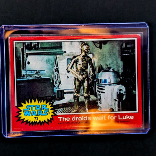 1977 Topps Star Wars trading card featuring C-3PO and R2-D2 titled The droids wait for Luke by Go Figment