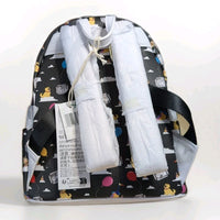 Loungefly black faux leather mini backpack with Disney Up character and colorful balloon pattern shown from back with protective wrapping