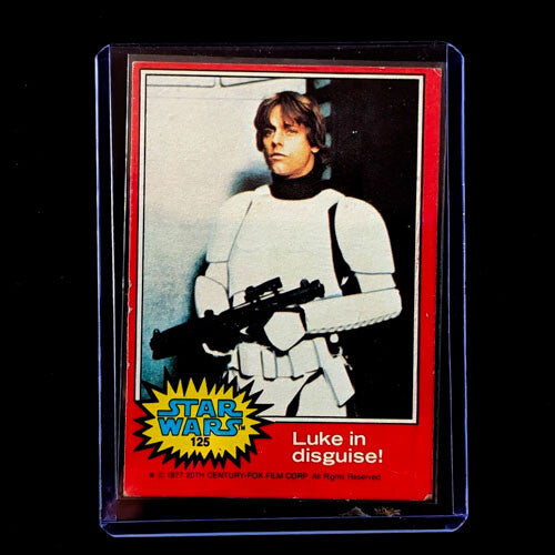 1977 Go Figment Star Wars trading card featuring Luke Skywalker in Stormtrooper disguise with red border and iconic logo