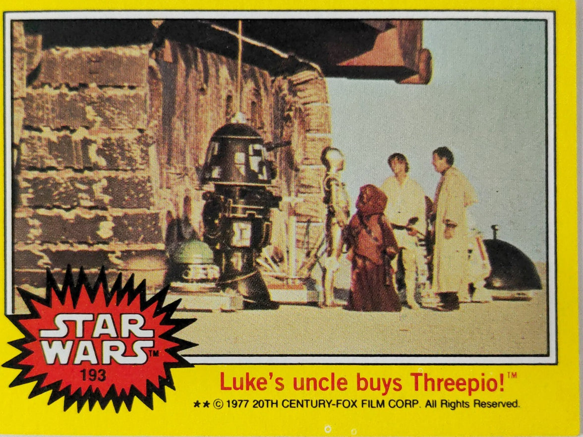 Vintage Star Wars trading card 193 Luke’s uncle buys Threepio with characters and droids outdoors