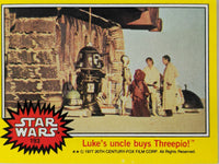Vintage Star Wars trading card 193 Luke’s uncle buys Threepio with characters and droids outdoors