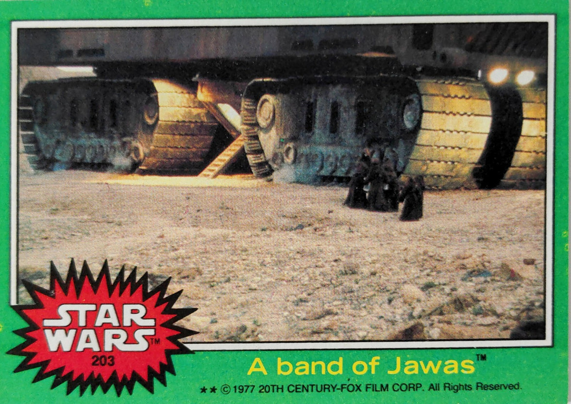 1977 Topps Star Wars card showing Jawas near a large vehicle on desert terrain by Go Figment