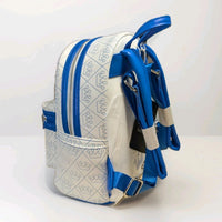 Loungefly mini backpack in white vegan leather with blue crown patterns and adjustable blue straps side angle view