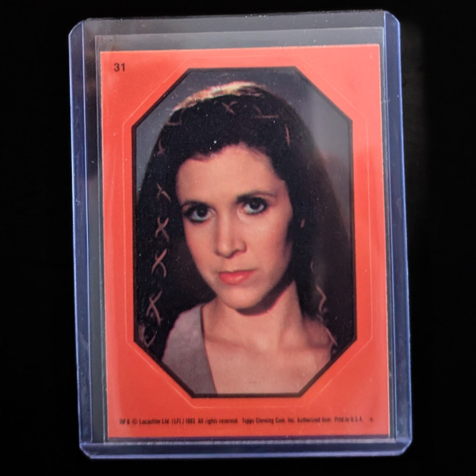 1983 Topps Return of the Jedi sticker featuring Princess Leia in orange border, vintage collectible from Go Figment