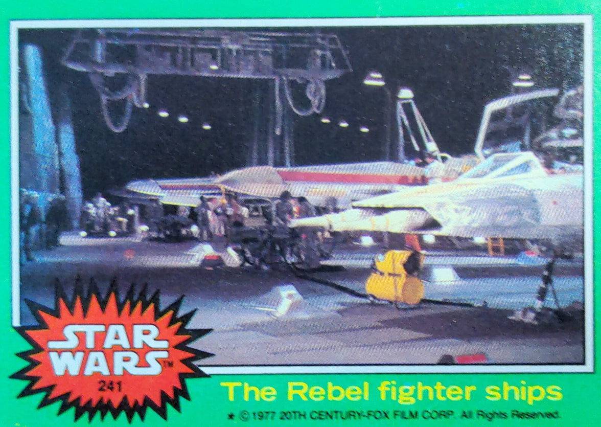 1977 Topps Star Wars Green Series card showing Rebel fighter ships displayed by Go Figment vintage collection