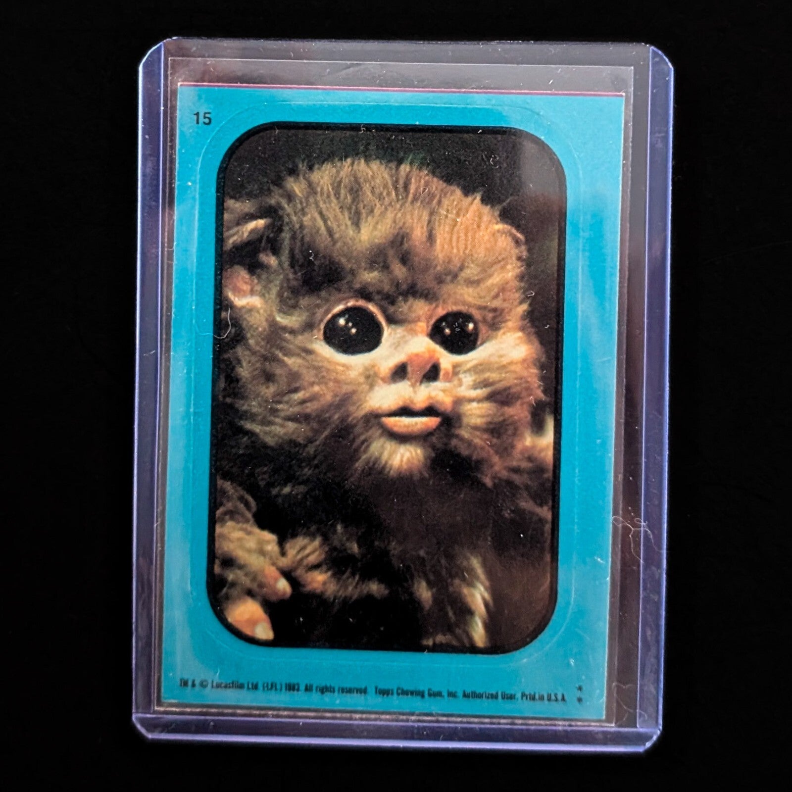 1983 Topps Return of the Jedi vintage sticker card of Ewok, protected in sleeve by Go Figment collector