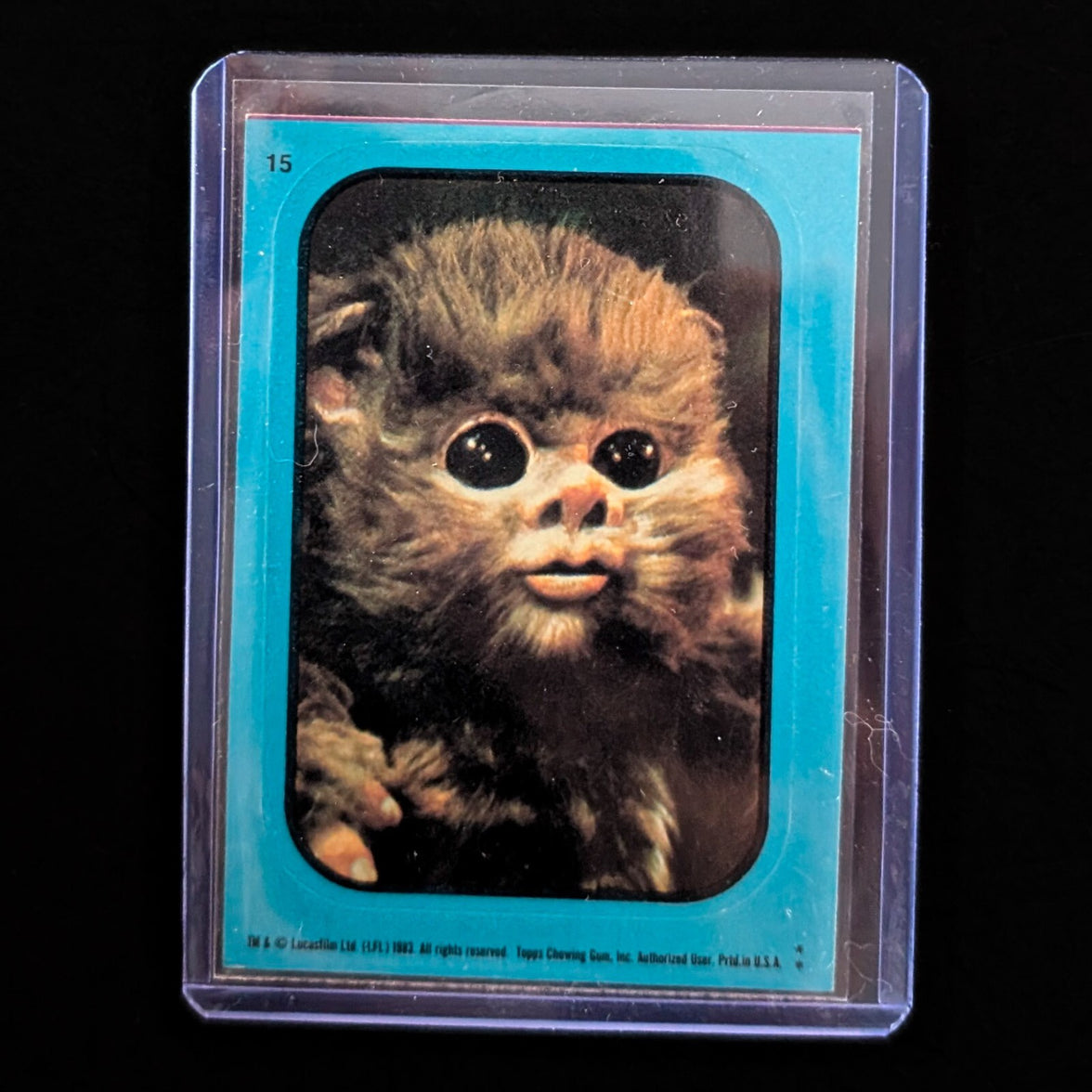 1983 Topps Return of the Jedi vintage sticker card of Ewok, protected in sleeve by Go Figment collector