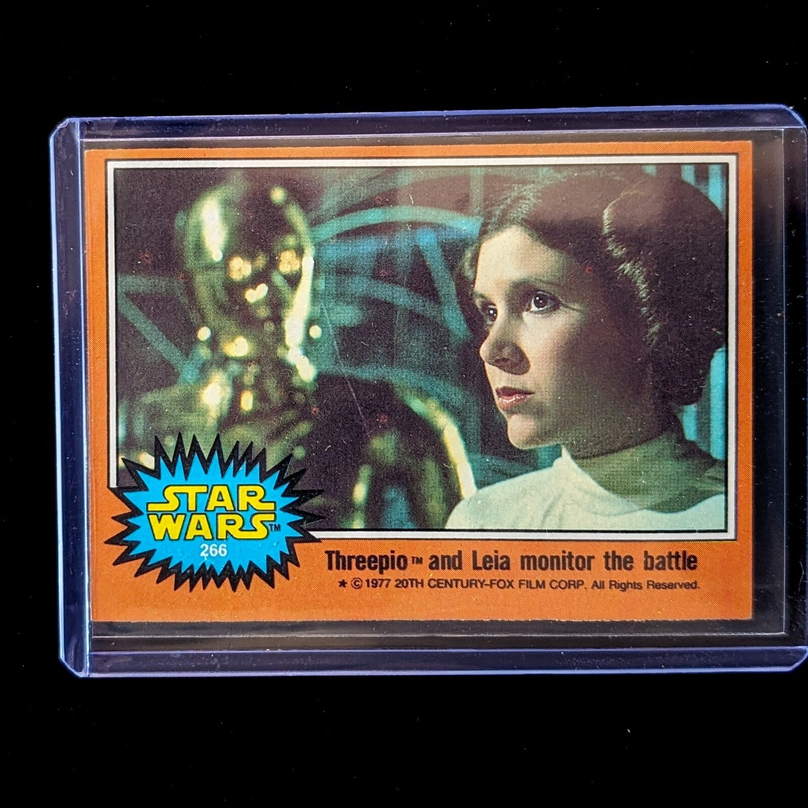1977 Go Figment TOPPS Star Wars trading card featuring Threepio and Leia from Orange Series 4 in protective case