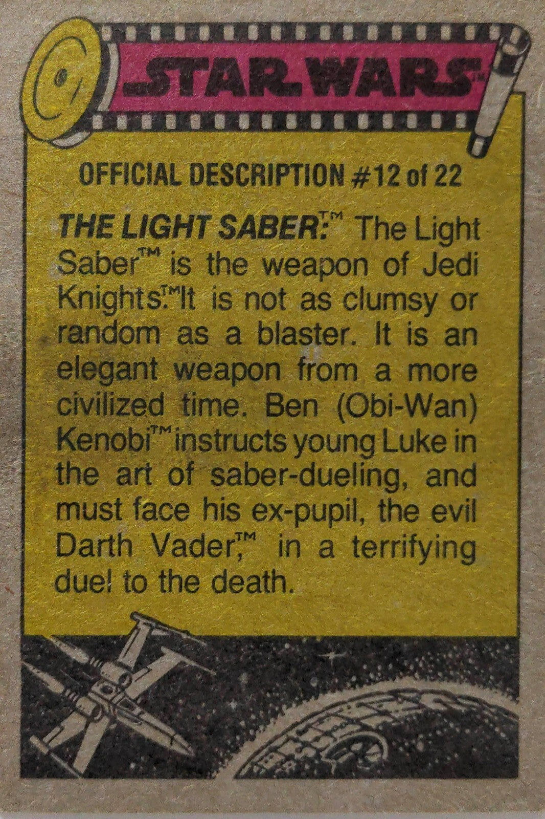 Vintage Star Wars card official description #12 detailing the Light Saber and key characters from the saga