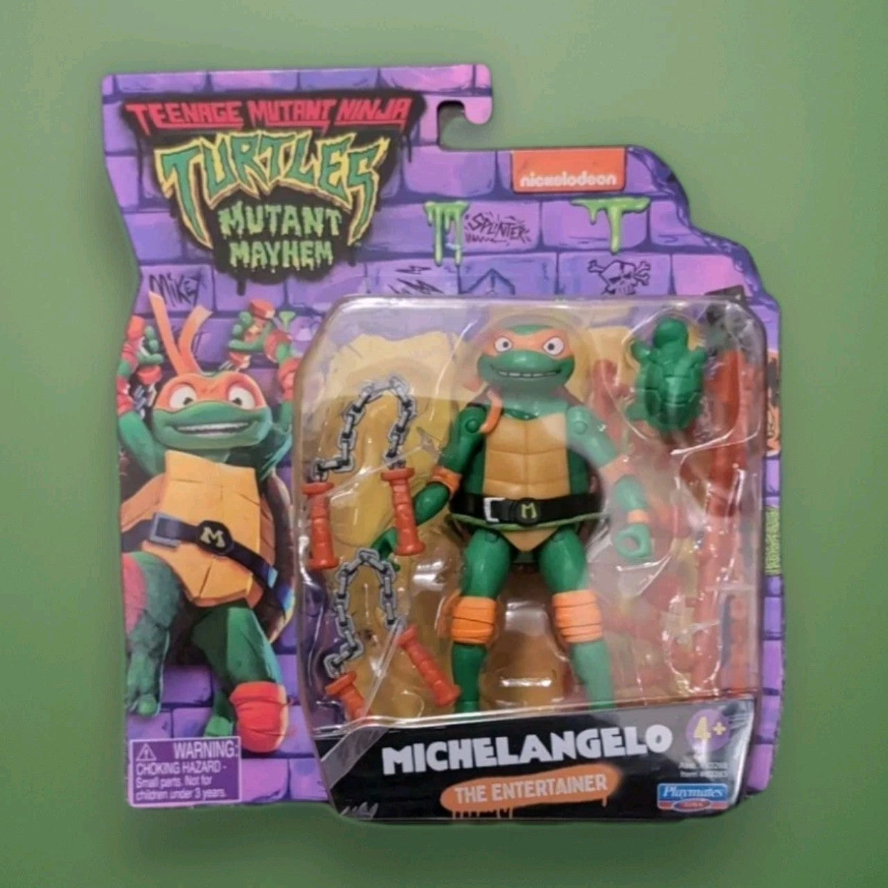 Teenage Mutant Ninja Turtles Michelangelo action figure with accessories by Playmates Toys in branded packaging