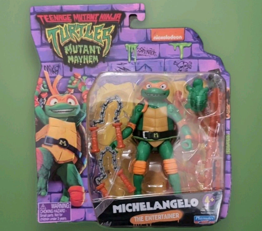 Teenage Mutant Ninja Turtles Michelangelo action figure with accessories by Playmates Toys in branded packaging