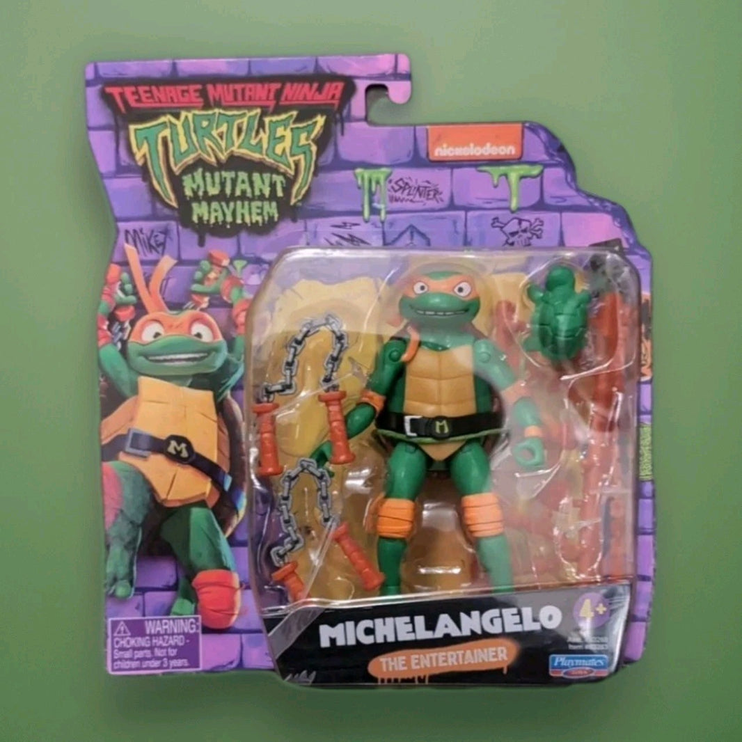 Teenage Mutant Ninja Turtles Michelangelo action figure with accessories by Playmates Toys in branded packaging