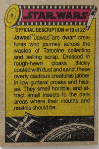 Vintage Star Wars trading card official description of Jawas with yellow background and film strip border