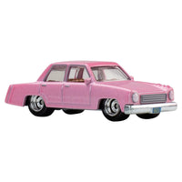 Pink vintage sedan toy car with chrome wheels and bumpers against a white background