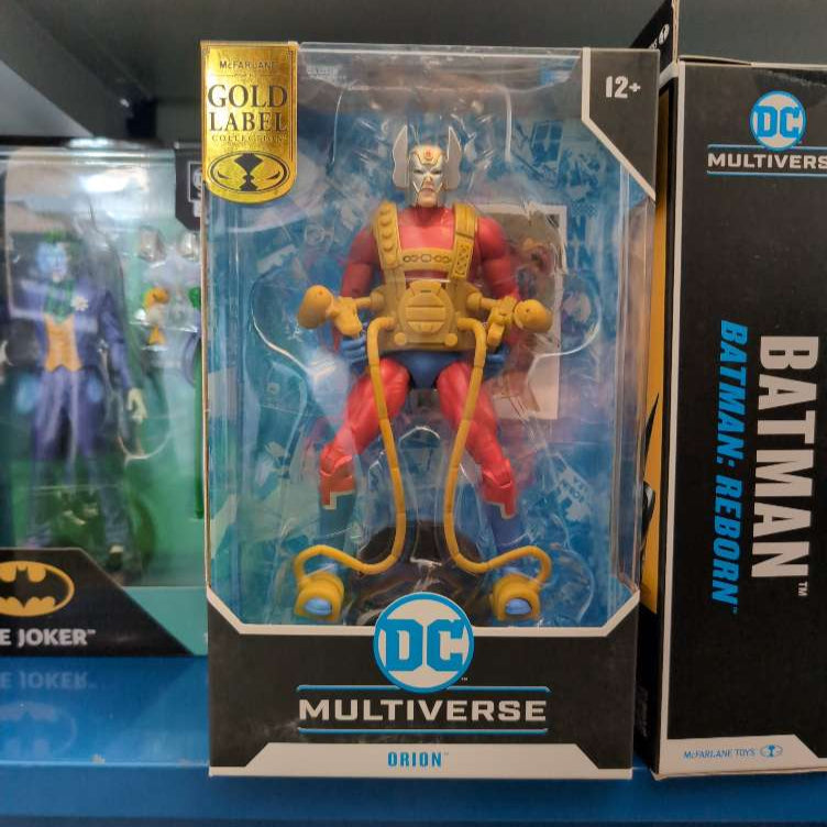 McFarlane DC Multiverse Orion Gold Label 7-inch action figure in packaging with blue and black background details