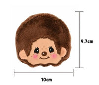 K-Wonderland Monchhichi plush coin purse with brown fuzzy hair and embroidered smiling face, measuring 10 by 9.7 cm