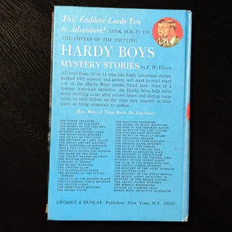 Vintage Hardy Boys book The Clue of the Broken Blade 1970 edition with classic blue cover and red spine details