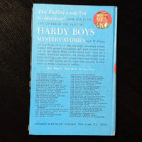 Vintage Hardy Boys book The Clue of the Broken Blade 1970 edition with classic blue cover and red spine details