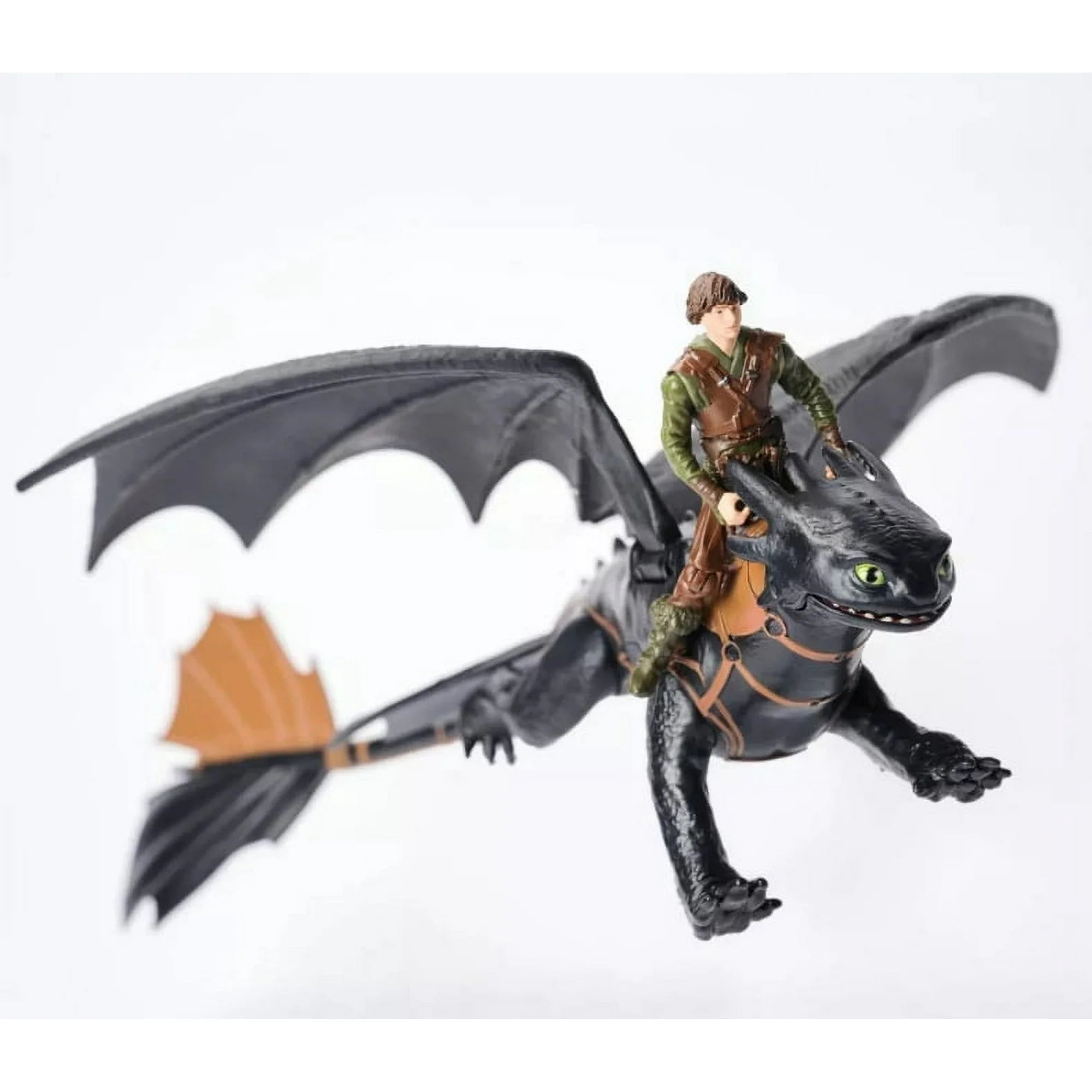 Spin Master How to Train Your Dragon Toothless figure with rider, detailed wings and articulated limbs in flight pose.